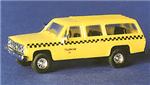Trident 90167 HO Chevrolet Suburban Taxis Yellow Cab (yellow, Black Checkerboard Graphics & Lettering) TDN90167 Trident